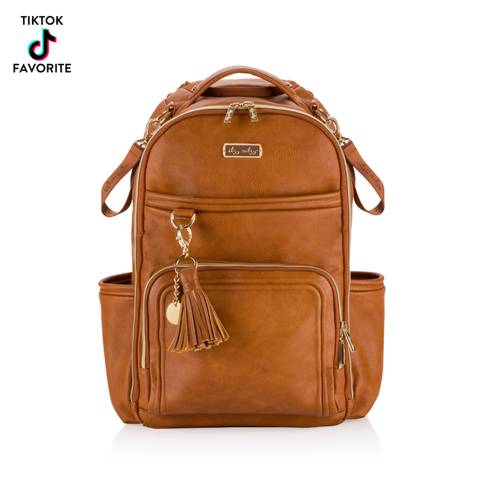 Brown leather diaper bag backpack with a tassel 